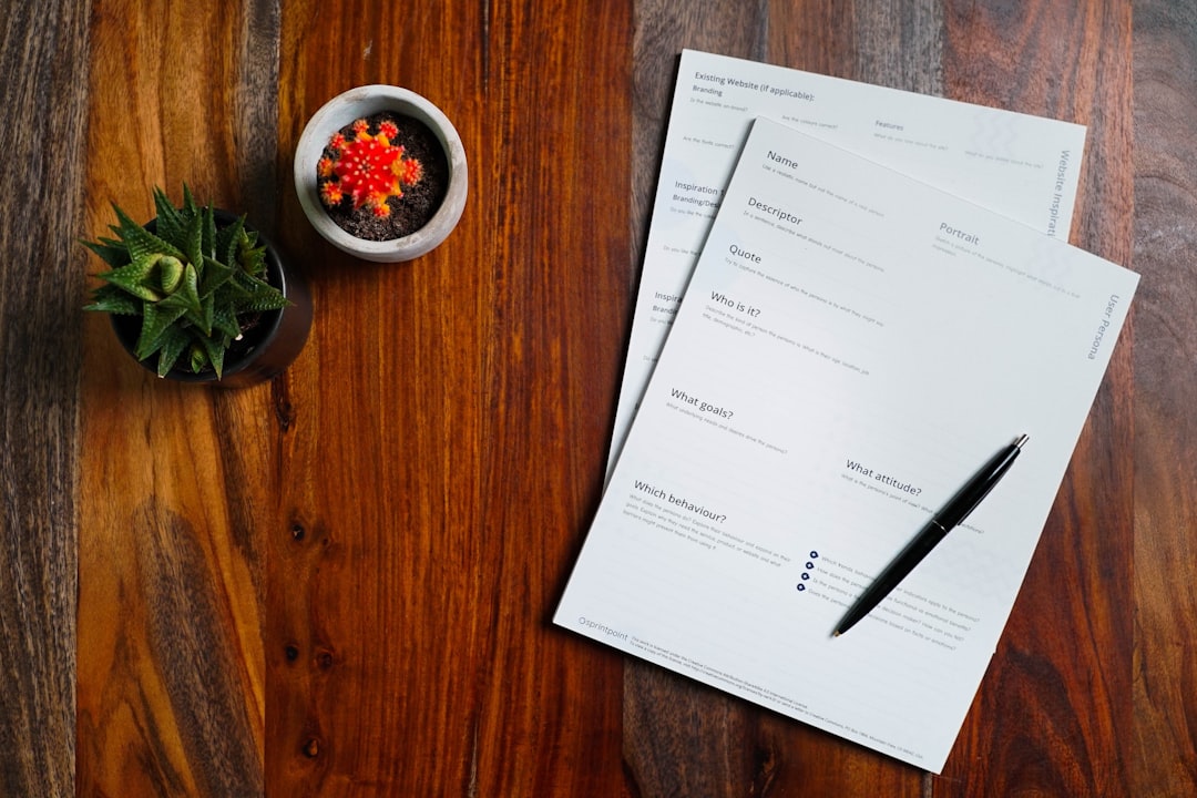 A small business owner reviewing kitchen space licensing documents for their NYC food startup