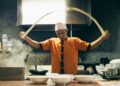 chef-serving-ramen-bowl-unsplash - NYCwebzine A chef carefully serves a steaming bowl at one of New York City's most celebrated ramen shops