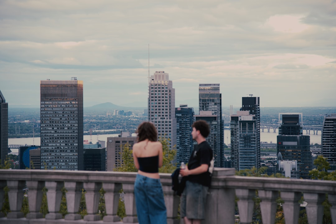 A couple sharing a meal at an outdoor terrace during a rooftop dining experience in New York City