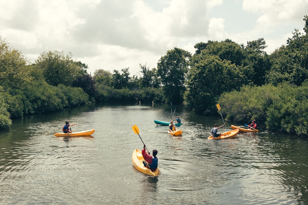 Children learning to kayak as part of free outdoor kids activities along the Hudson River in NYC