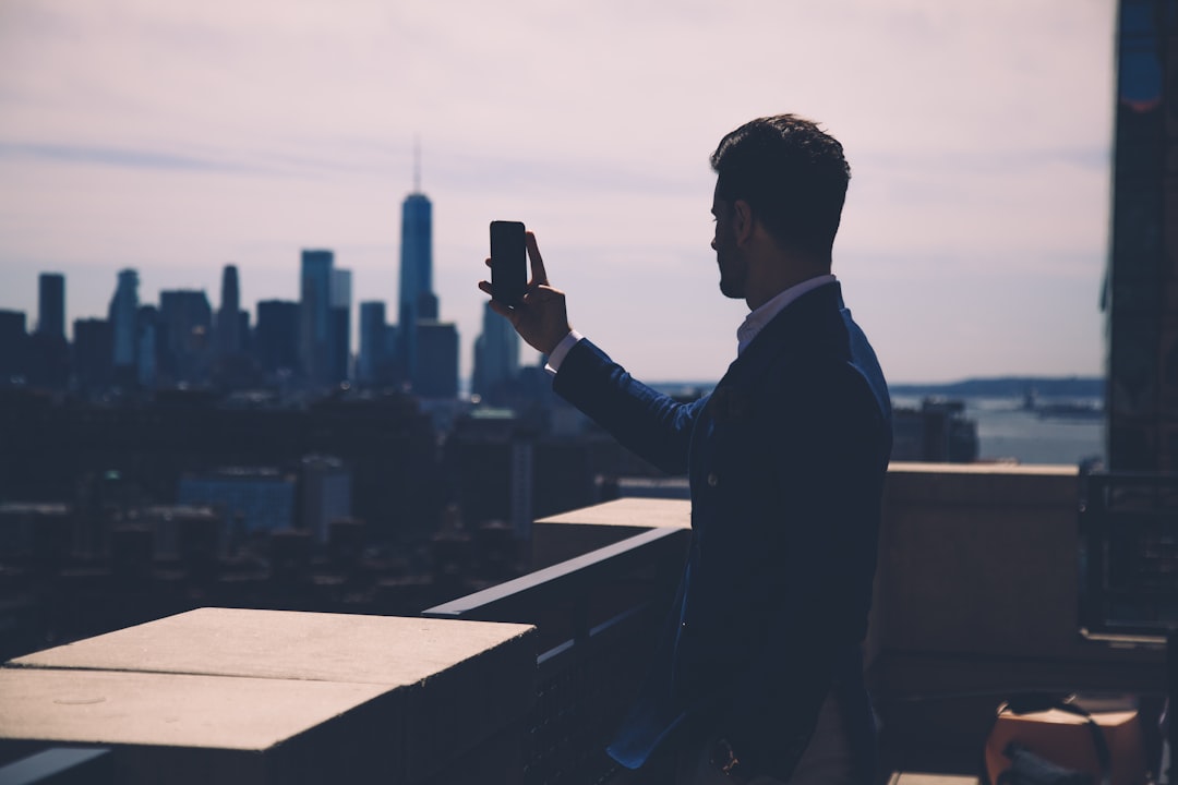 A real estate agent explains pied-à-terre tax implications to a buyer viewing a high-value New York City condo