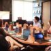 startup-founder-investor-meeting-unsplash - NYCwebzine A startup founder presenting to her first investor in a New York City office, with a pitch deck visible on screen