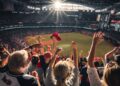 crowd-cheering-stadium-unsplash - NYCwebzine A fan cheering from the stands at Flushing Meadows during the US Open main draw at Arthur Ashe Stadium