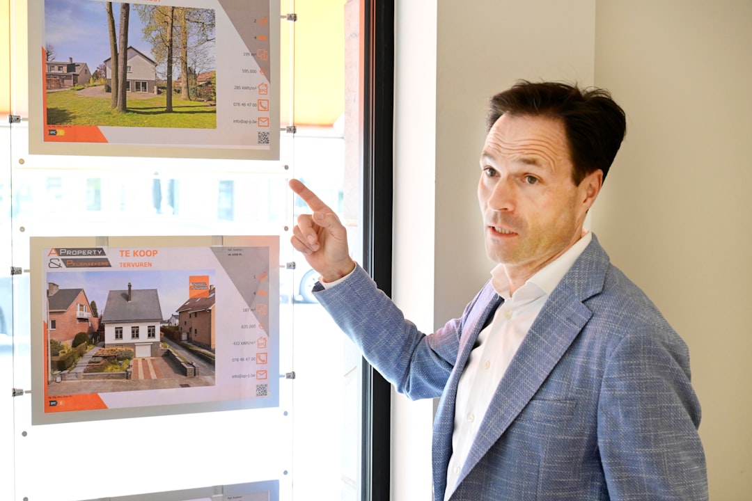 Two investors discuss acquisition terms for storage units in a New York City commercial real estate office.