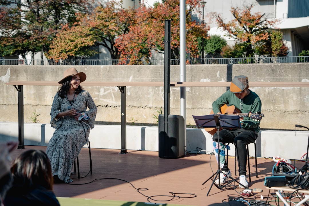 A jazz musician performing for an outdoor audience at one of New York City's free outdoor concerts in a public park