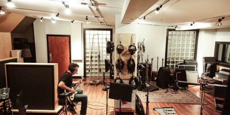 musician-recording-microphone-studio-unsplash - NYCwebzine An independent artist recording vocals in an affordable studio space in New York City