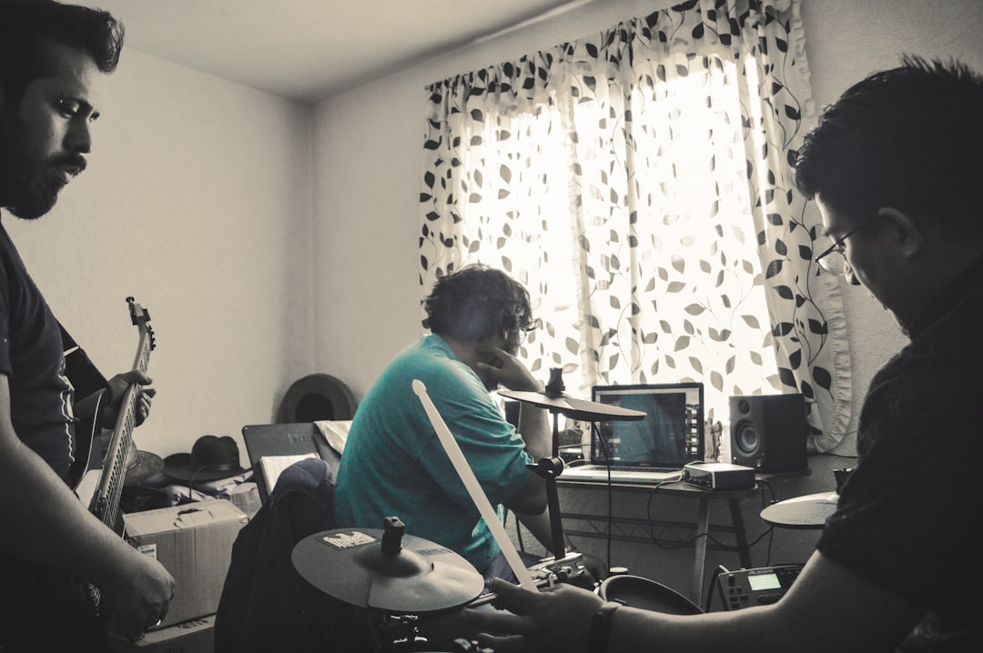 A group of musicians rehearsing together in a subsidized studio space in NYC