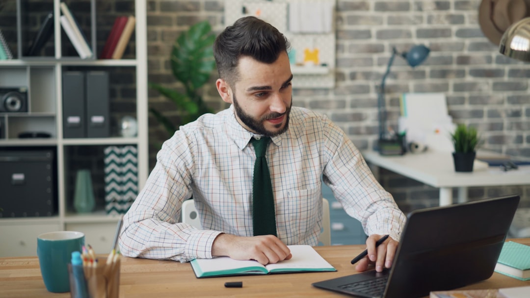 An accountant calculates payroll costs for a company's first employee in NYC