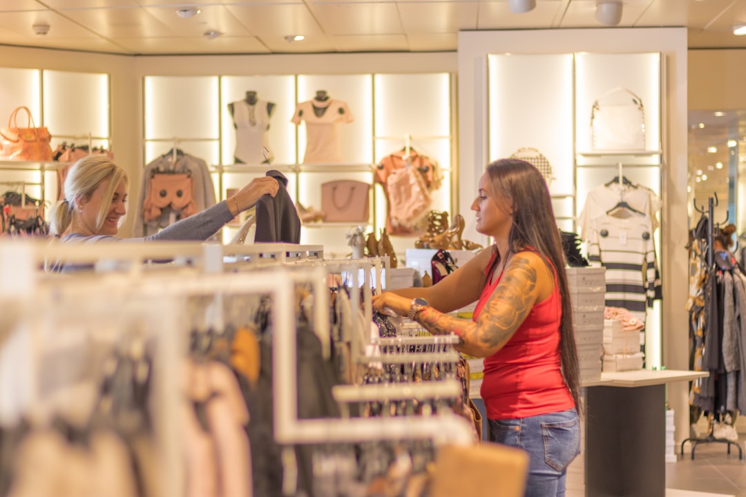A staff member assisting a customer inside a pop-up retail store in New York City