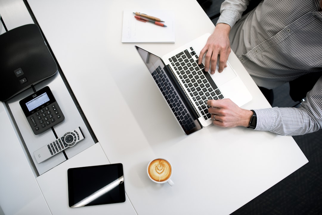 A self-employed professional reviews tax compliance documents for a sole proprietorship registered in NYC