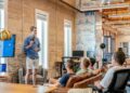 A startup founder presenting to accelerator investors, preparing to pitch your business in a New York City conference room