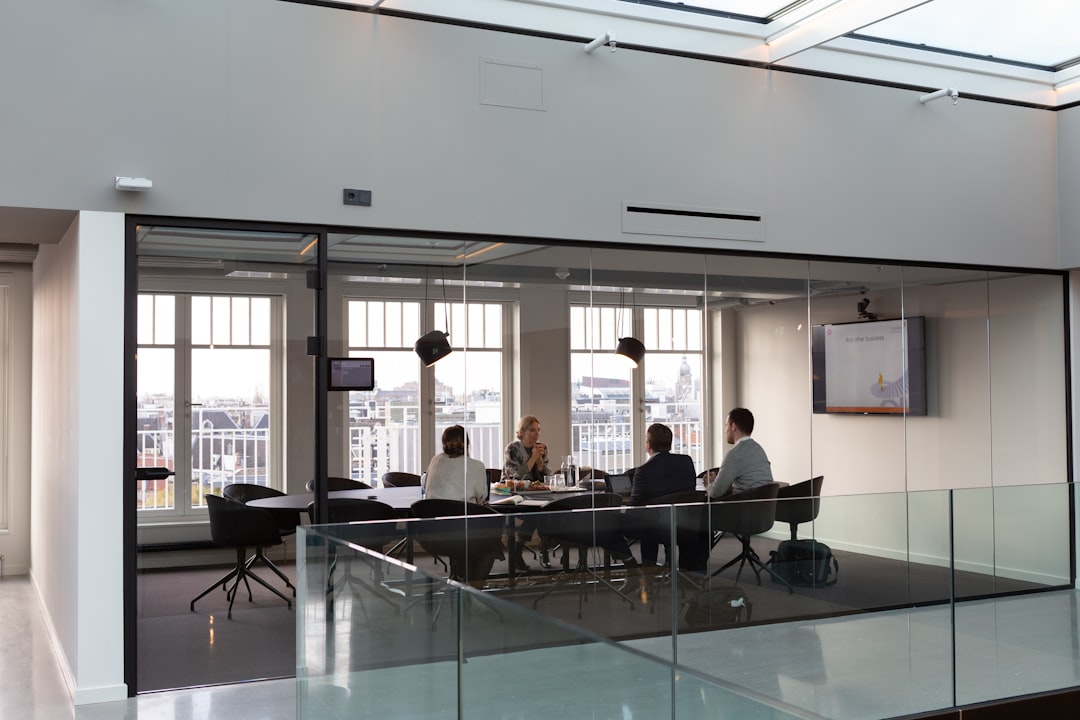 An entrepreneur controls the details they share about their business idea during a formal pitch meeting in New York City