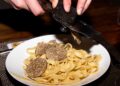 chef-shaving-truffle-over-pasta-unsplash - NYCwebzine A chef shaves fresh Alba white truffle over handmade pasta at one of New York City's most celebrated truffle dinners