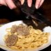 chef-shaving-truffle-over-pasta-unsplash - NYCwebzine A chef shaves fresh Alba white truffle over handmade pasta at one of New York City's most celebrated truffle dinners