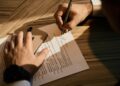 A New York City founder reviews an NDA document to protect a business idea before a pitch meeting