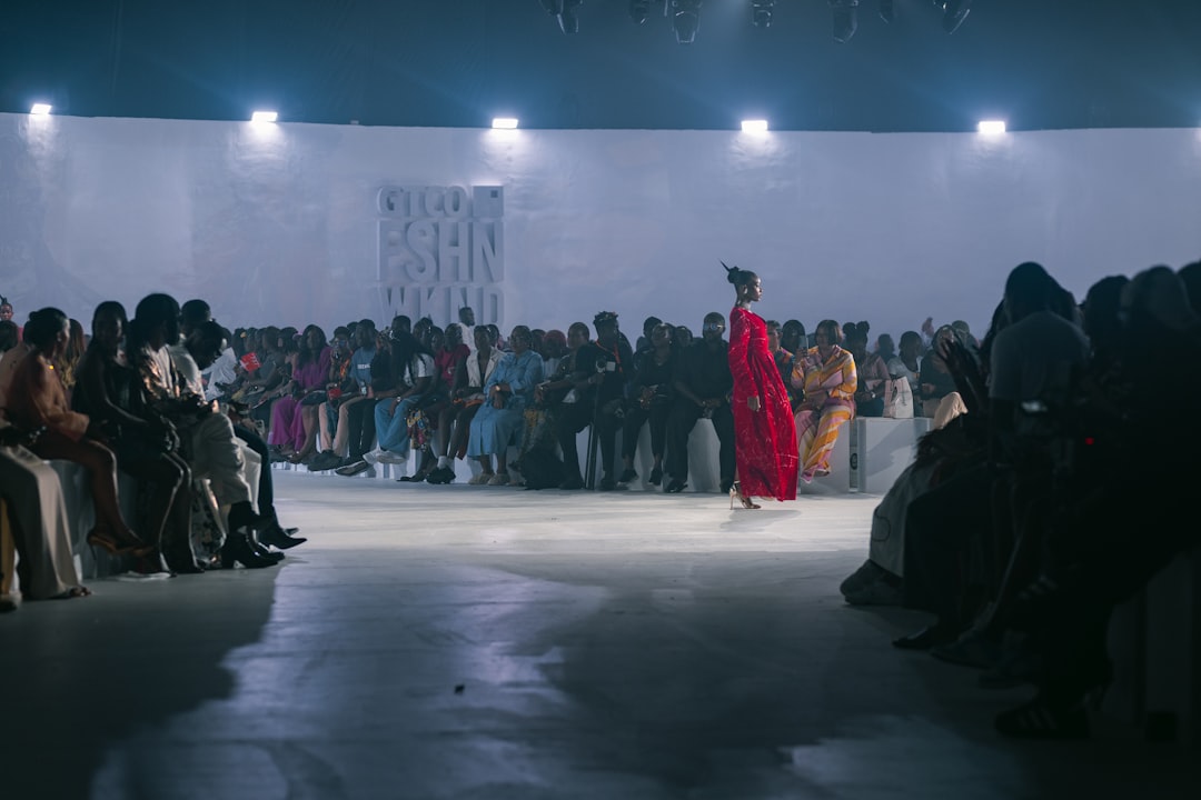 A guest watches emerging designers present collections during New York Fashion Week
