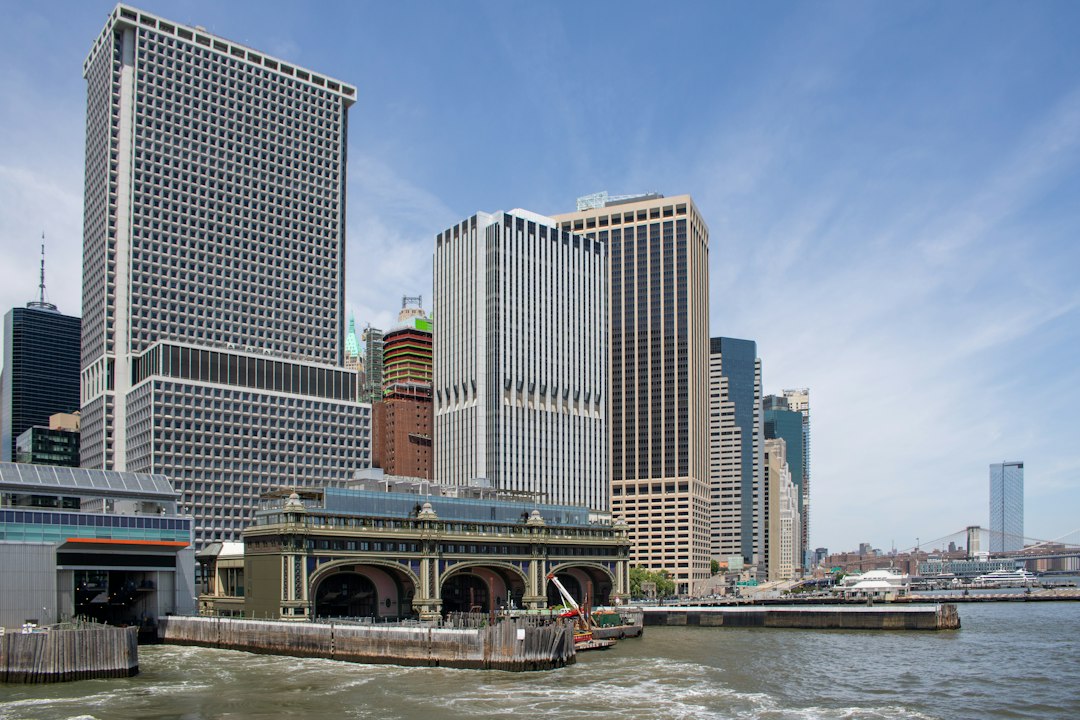 Visitor waits at the ferry dock for day trips from NYC