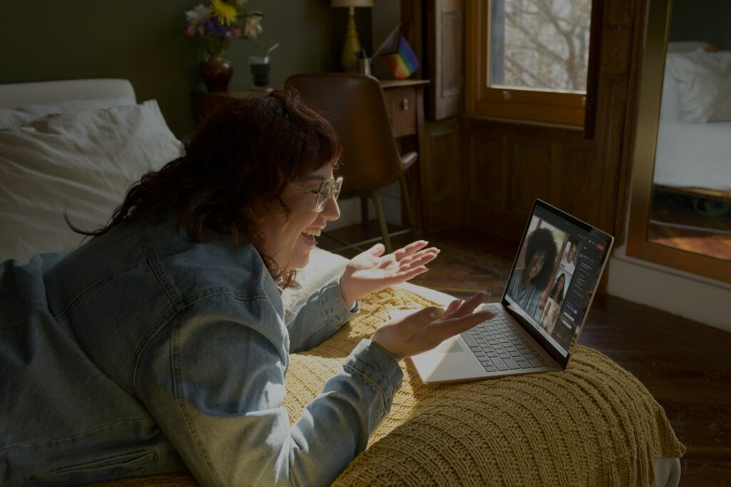 Woman starting a telehealth session with an NYC therapist